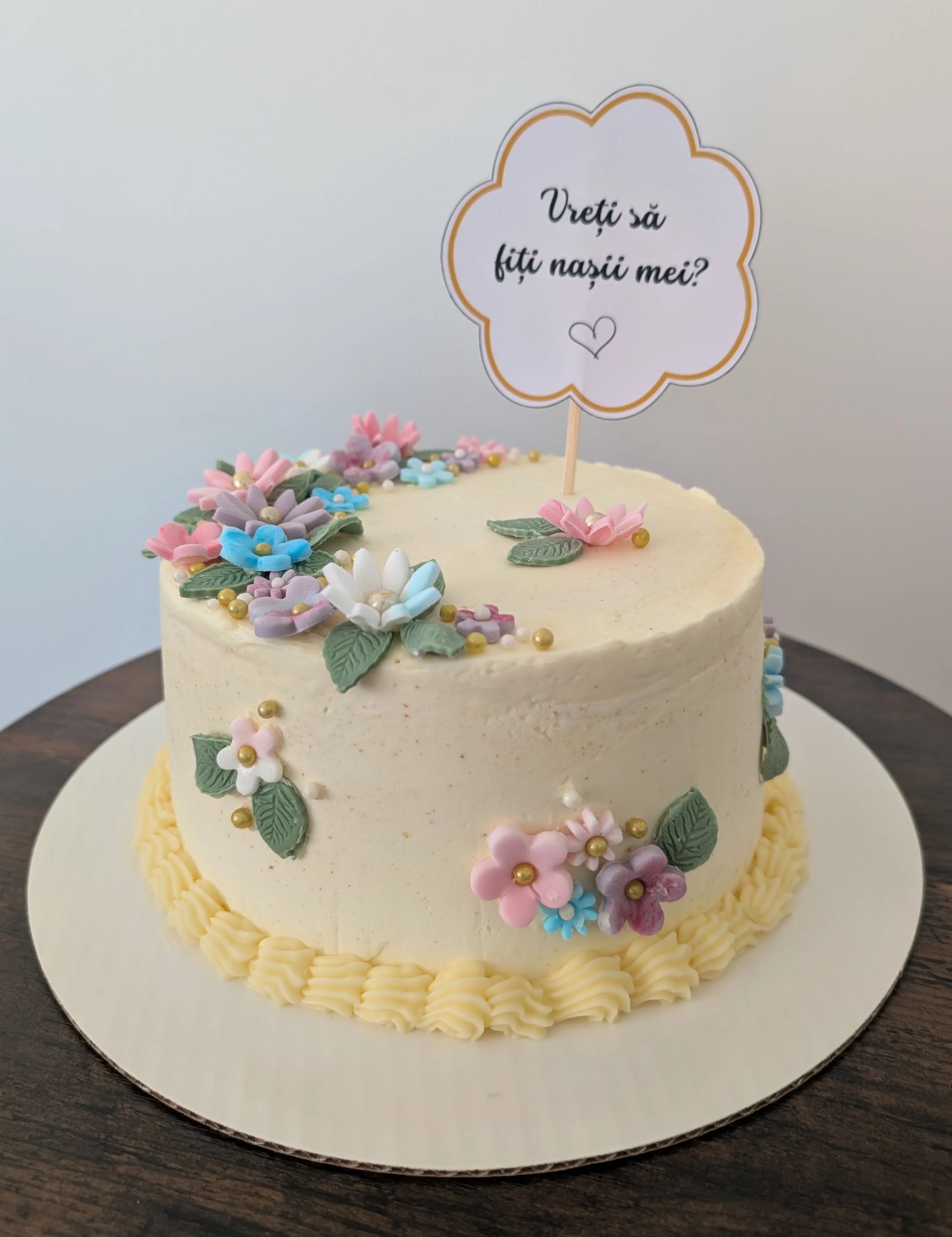 Custom floral cake with cardstock decorations